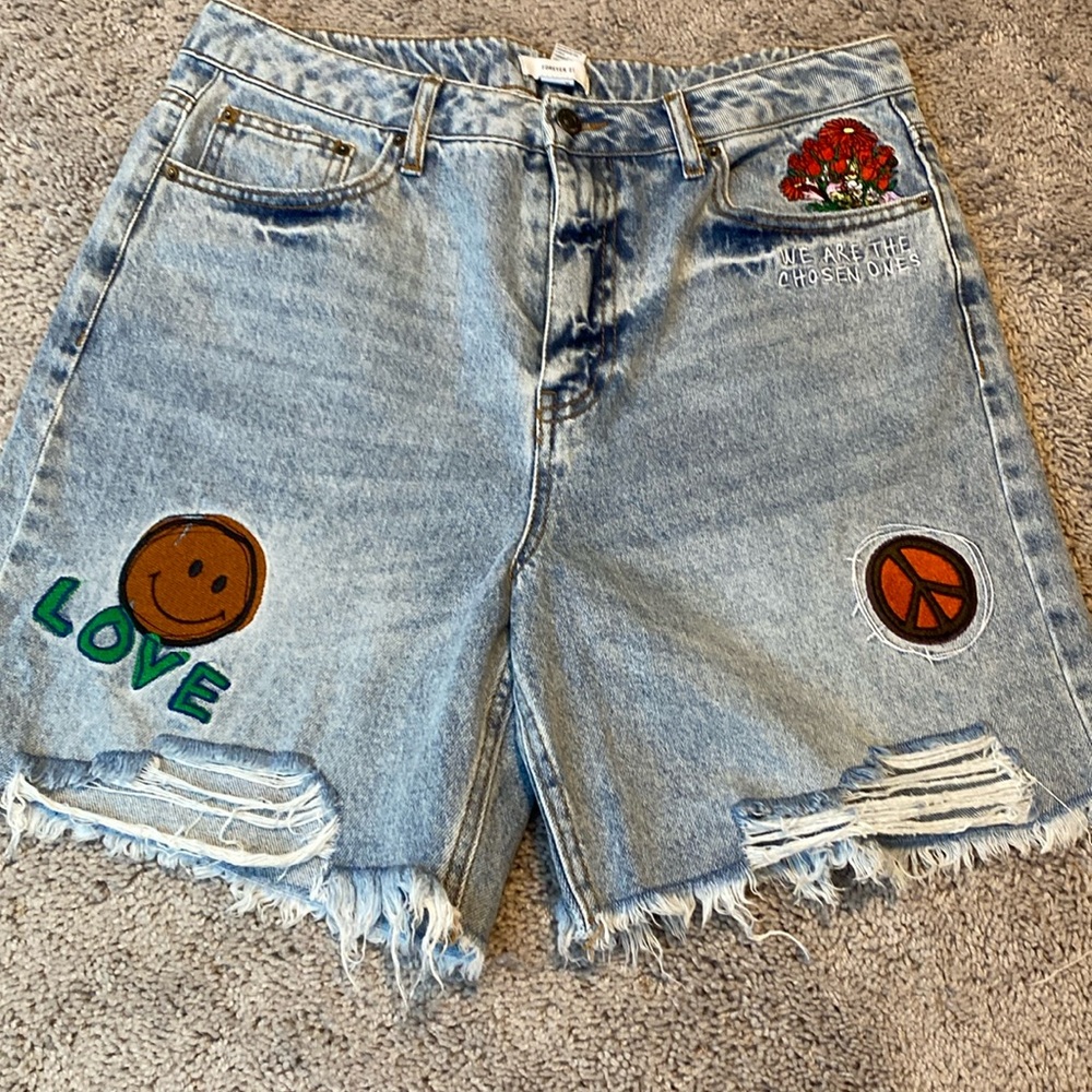 Patched denim shorts